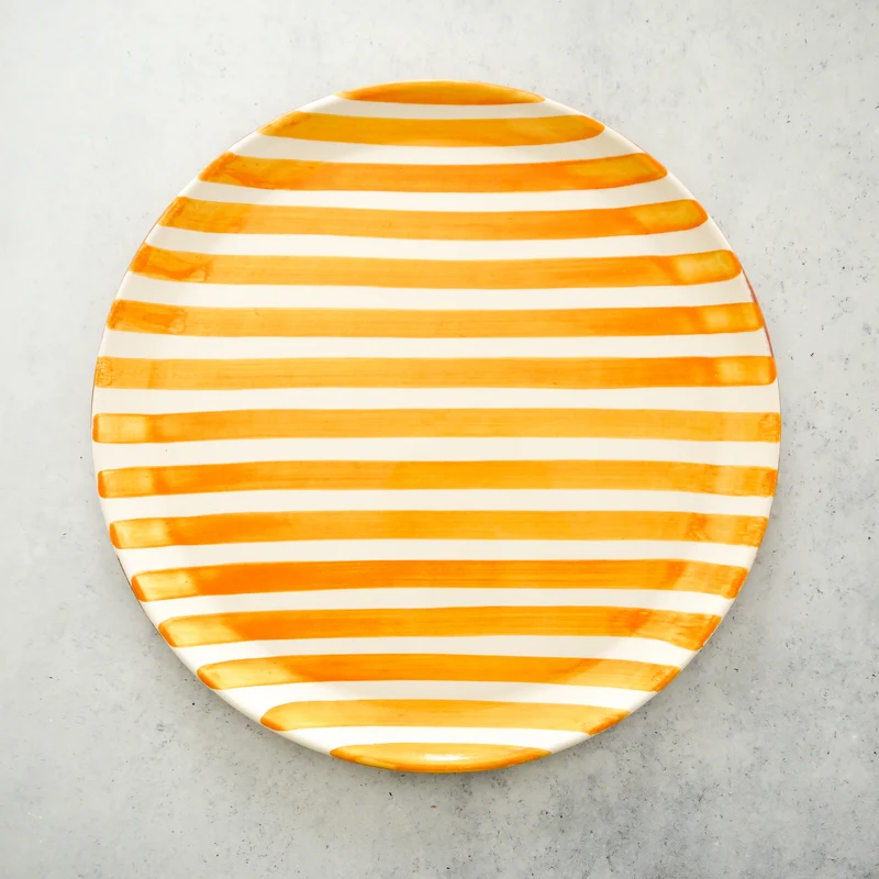 Plato con rayas en relieve en color amarillo, Ø 41 cm